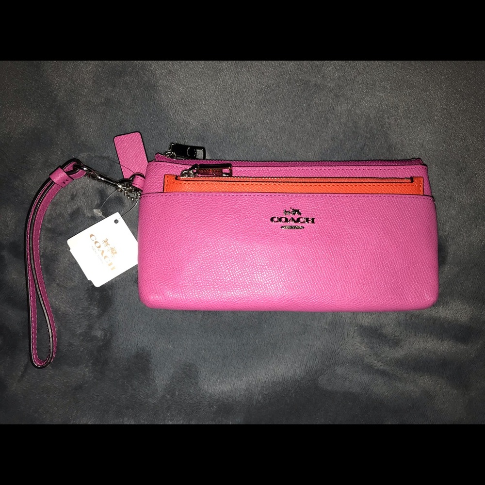 COACH fuchsia pebble leather large zip wristlet